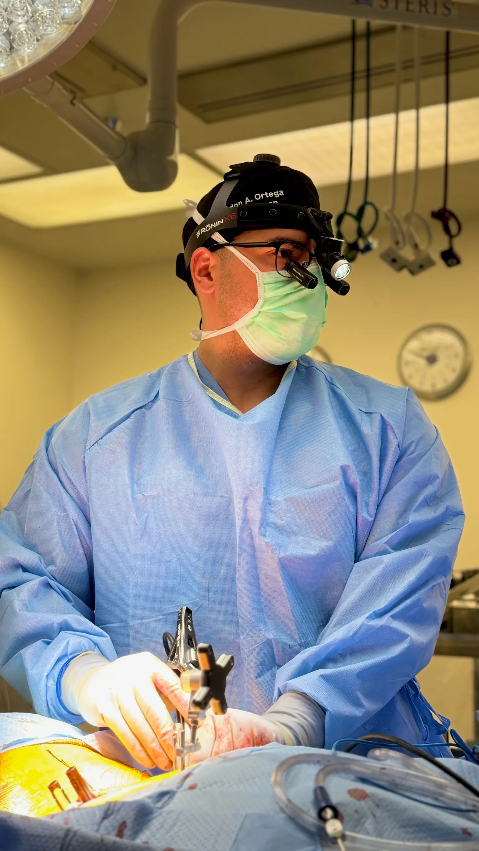 Brandon A. Ortega, MD performing minimally invasive surgery